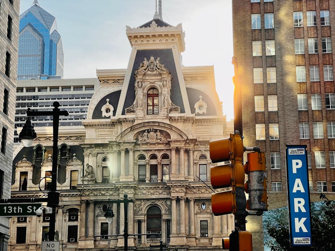a large building with a clock on the front of it — Photo by Micah Giszack on Unsplash