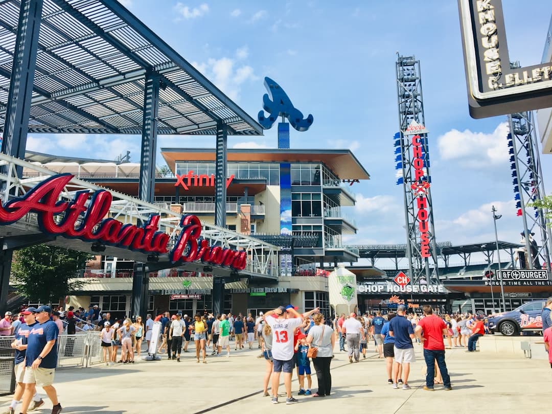 people in a stadium during daytime — Photo by Erin Doering on Unsplash
