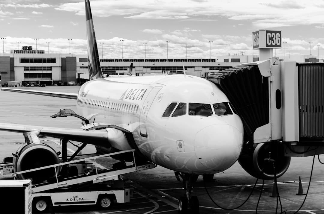 a large jetliner sitting on top of an airport tarmac — Photo by Scott Fillmer on Unsplash