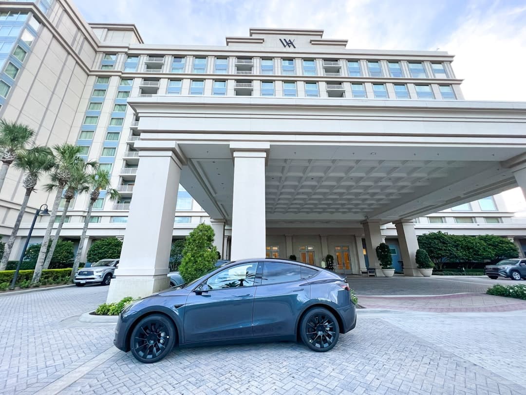 a car parked in front of a building — Photo by Upgraded Points on Unsplash