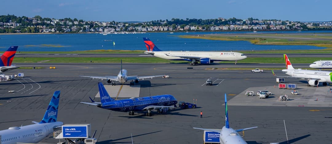 a group of airplanes at an airport — Photo by Philippe Murray-Pietsch on Unsplash