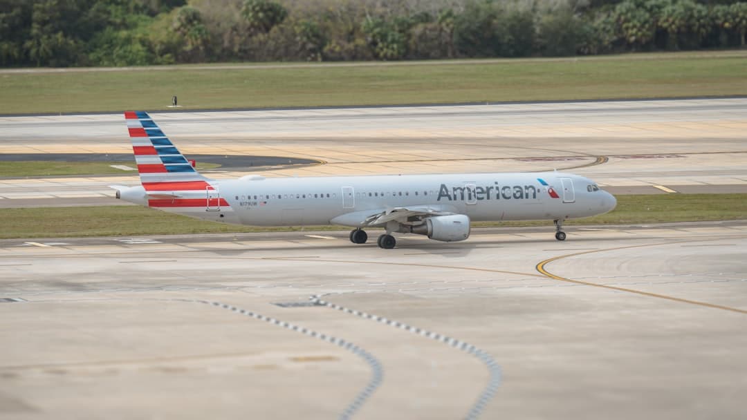an american airlines plane is on the runway — Photo by Hans Dorries on Unsplash
