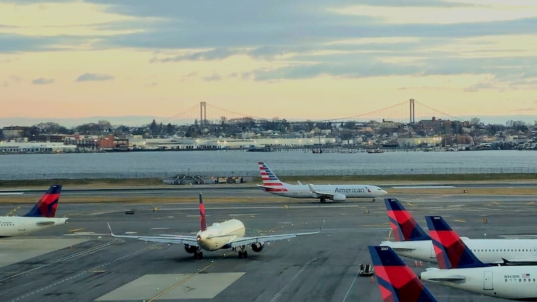 a bunch of airplanes that are on a runway — Photo by Preston A Larimer on Unsplash