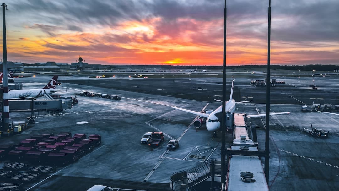 a large jetliner sitting on top of an airport tarmac — Photo by Mika Baumeister on Unsplash