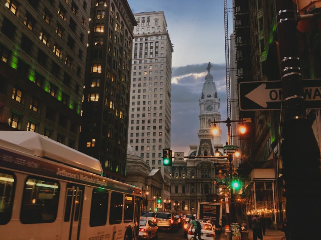 a city street filled with traffic next to tall buildings — Photo by Nick Agee on Unsplash