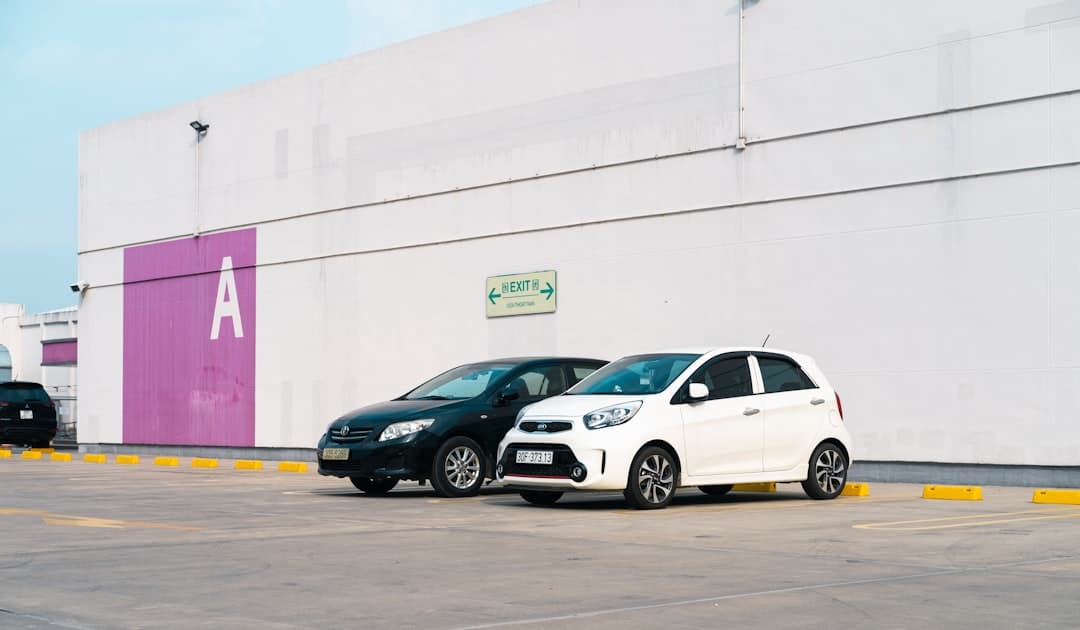 a group of cars parked outside a building — Photo by Nguyễn Hiệp on Unsplash