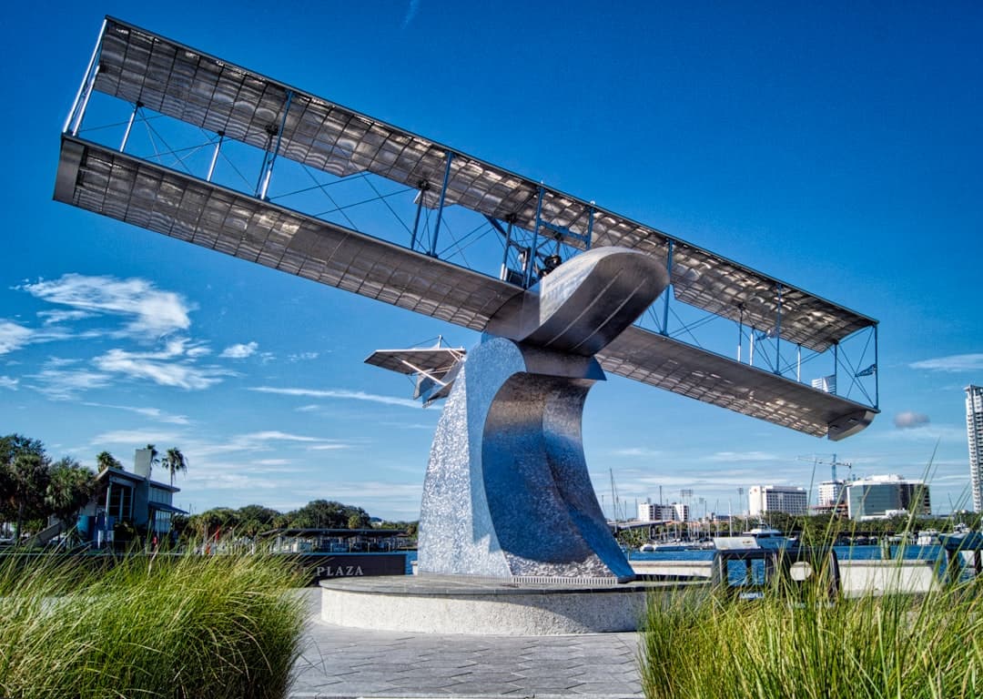 a sculpture of an airplane is in the grass — Photo by Matt Staehle on Unsplash