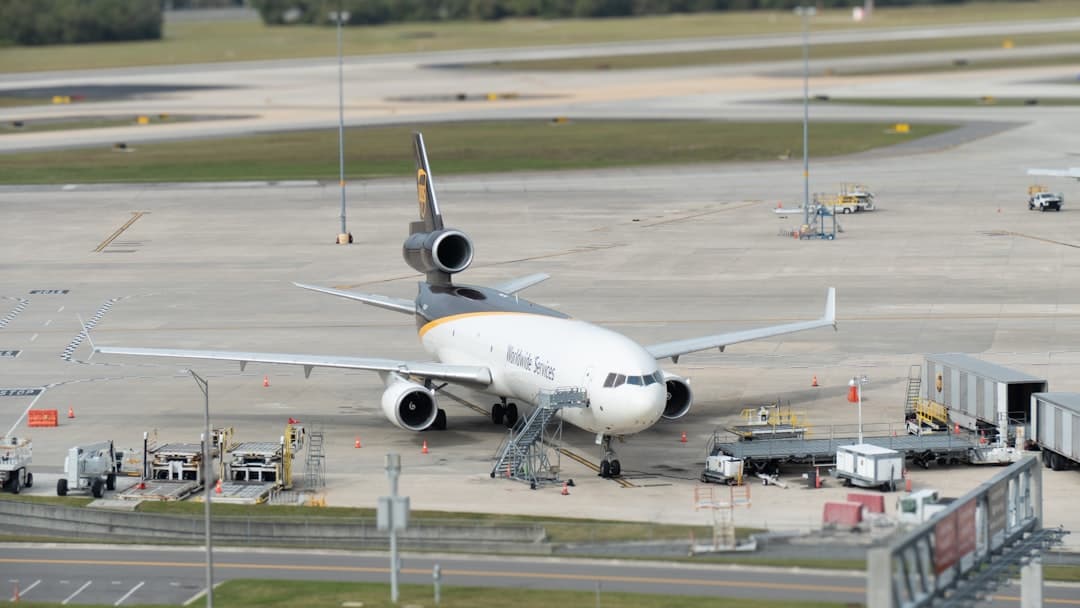 a large jetliner sitting on top of an airport tarmac — Photo by Hans Dorries on Unsplash
