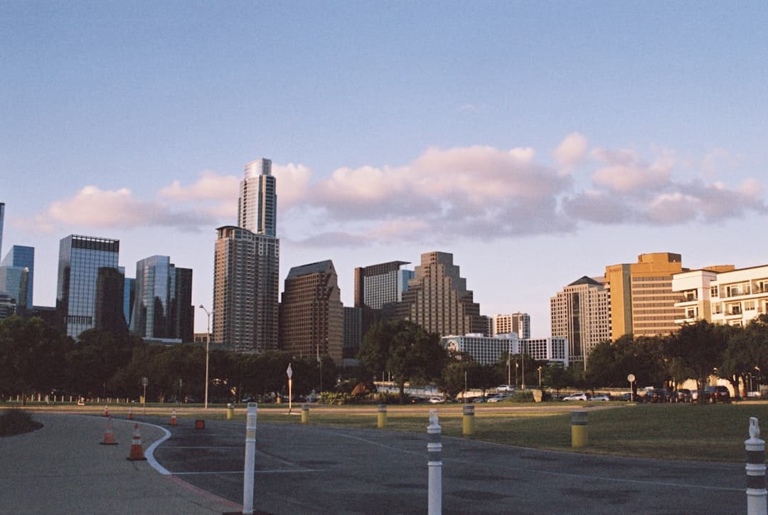 city buildings under blue sky during daytime — Photo by Samuel Bauman on Unsplash
