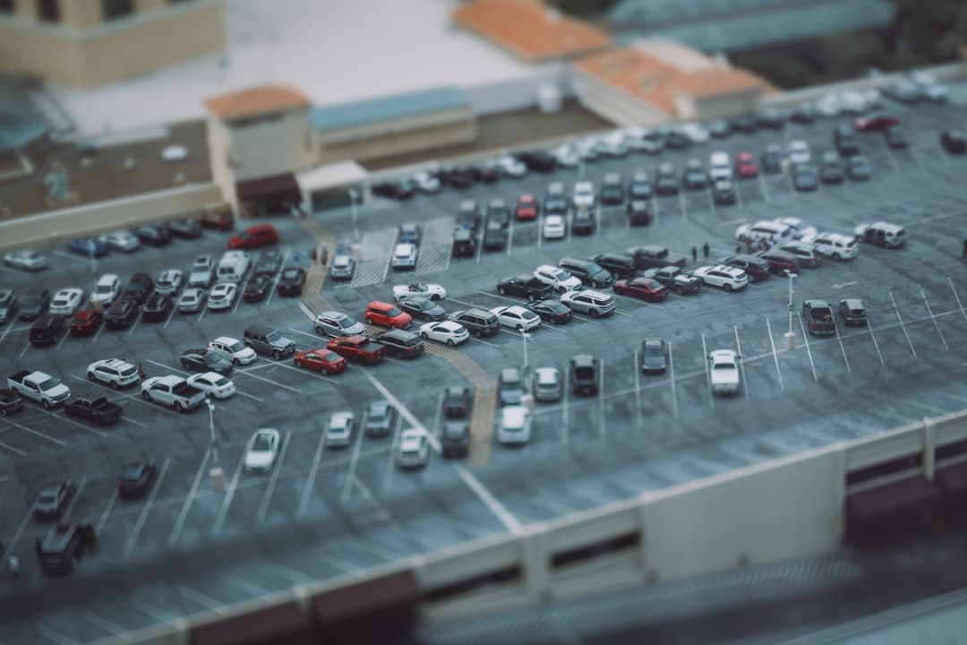 a parking lot full of cars — Photo by Yifu Wu on Unsplash