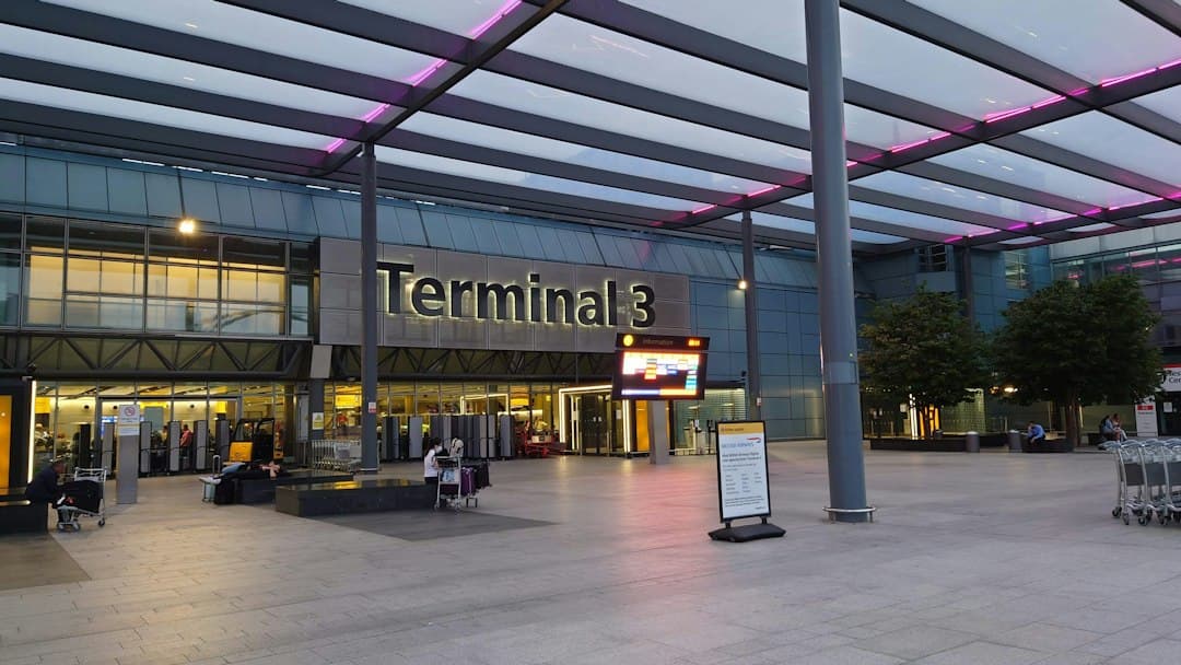 a terminal with a sign that says terminal 3 — Photo by CabService London on Unsplash