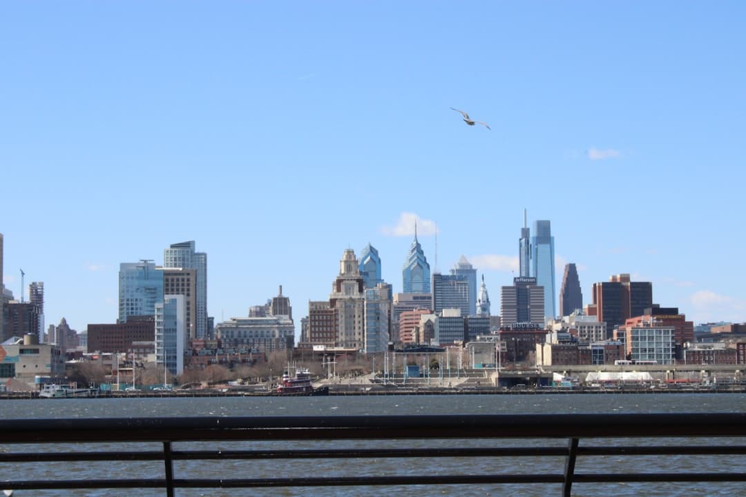 city skyline under blue sky during daytime — Photo by Salonagility.com Daniel on Unsplash