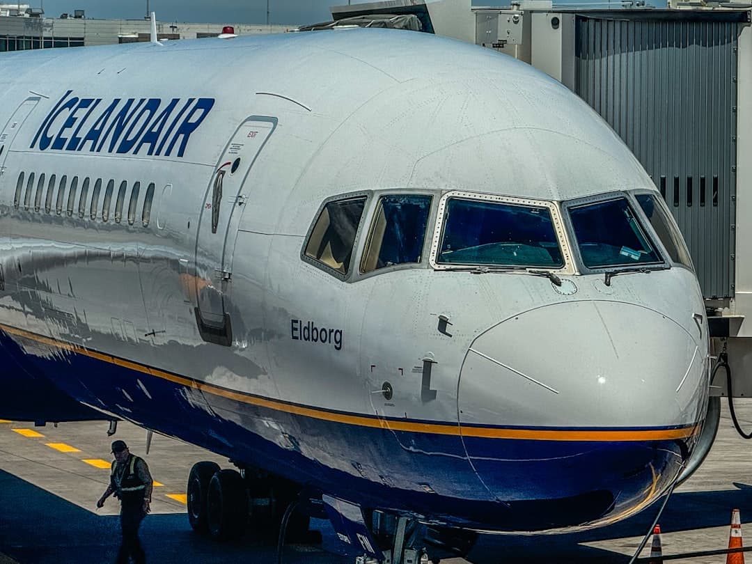 A large jetliner sitting on top of an airport tarmac — Photo by Michael Evans on Unsplash
