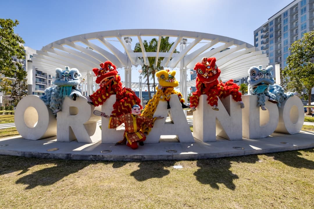 a group of stuffed animals standing in front of a sign — Photo by Mick Haupt on Unsplash