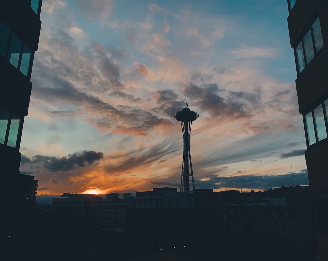 silhouette of building during sunset — Photo by Yan Liu on Unsplash