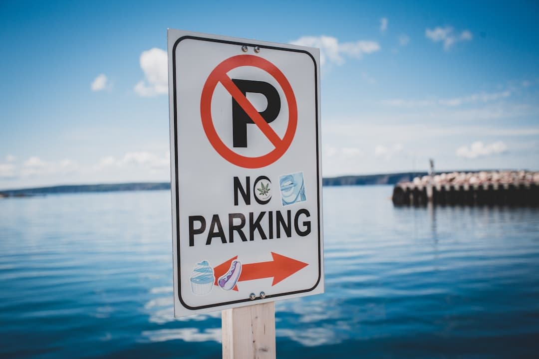 a sign on a post — Photo by Erik Mclean on Unsplash