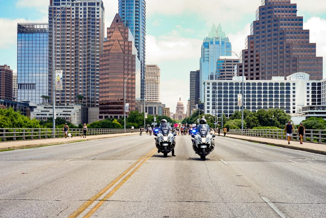 people riding motorcycle on road during daytime — Photo by Megan Bucknall on Unsplash