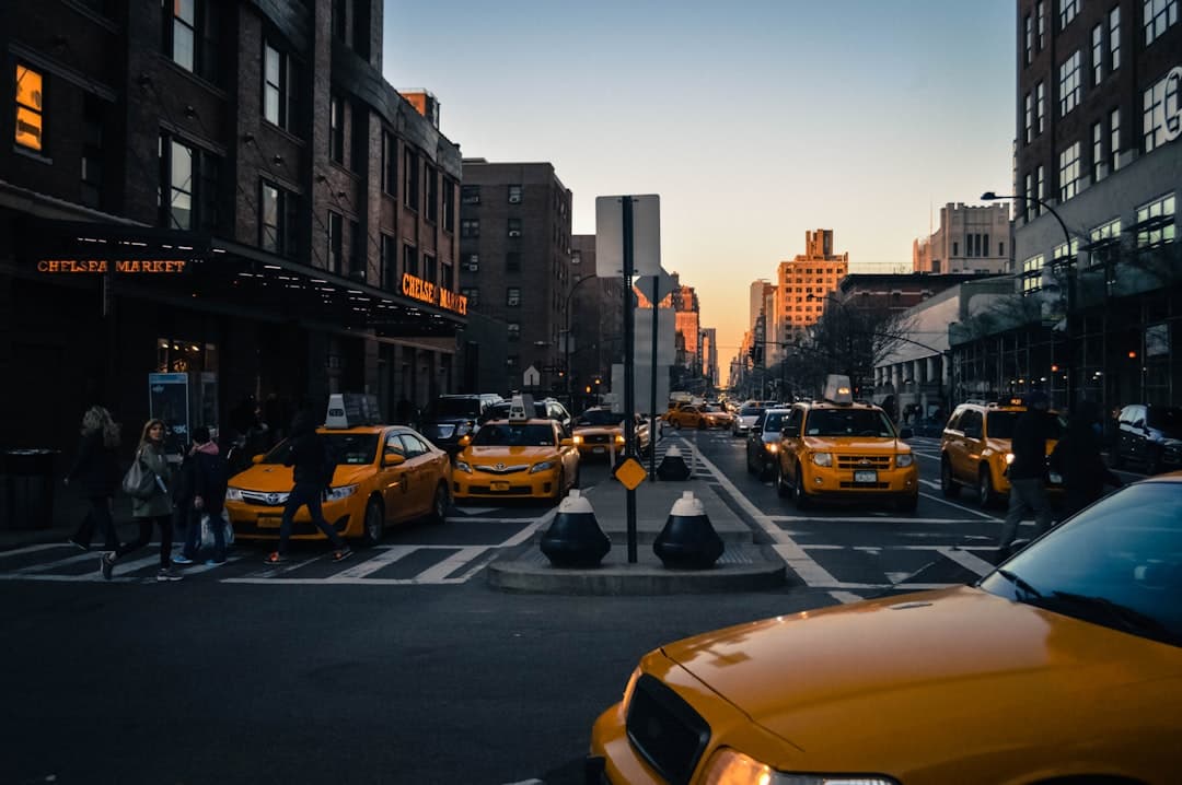 yellow car on road — Photo by Alex Braga on Unsplash
