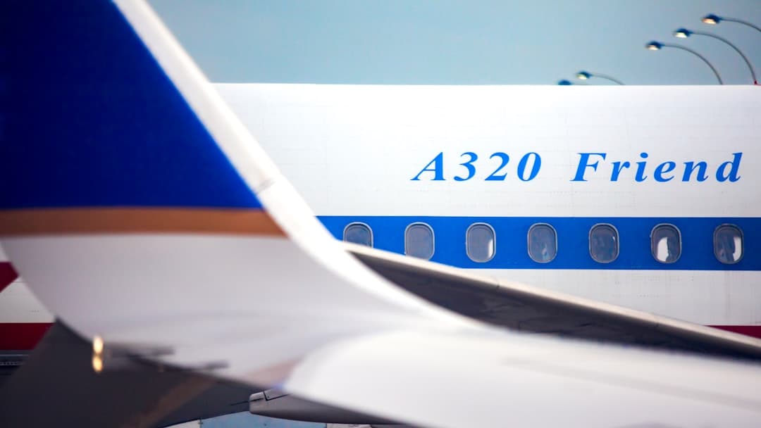 white and blue airplane window — Photo by Rafik Wahba on Unsplash