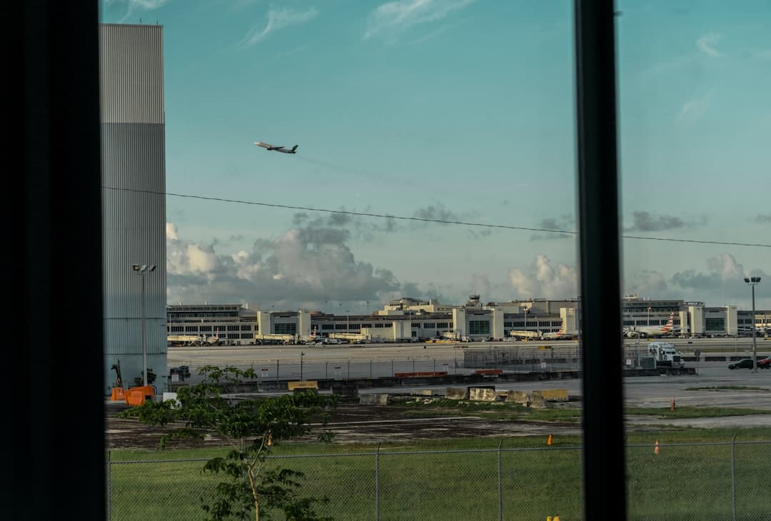 A view of an airport from a window — Photo by Jean Carlos Taravine Smith on Unsplash