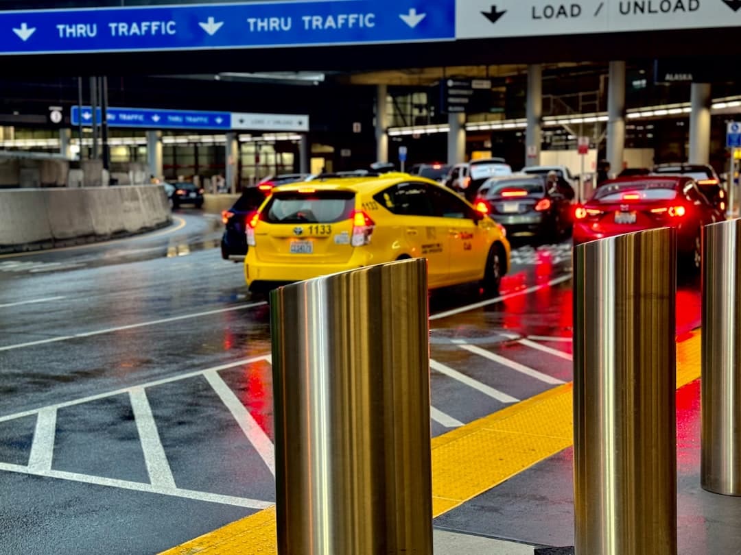 A city street filled with lots of traffic — Photo by Kevin Doyle on Unsplash