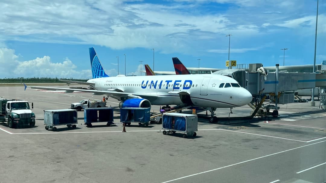 a large jetliner sitting on top of an airport tarmac — Photo by JR Black on Unsplash