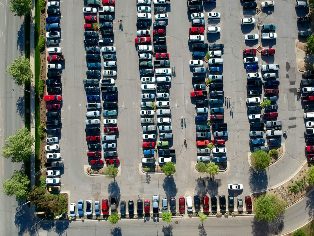bird's-eye view photography of car park — Photo by Lucas Hobbs on Unsplash