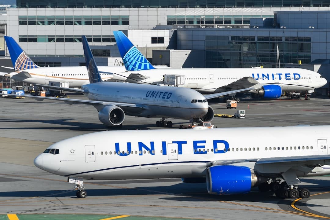Three united airplanes are parked at the airport. — Photo by David Syphers on Unsplash