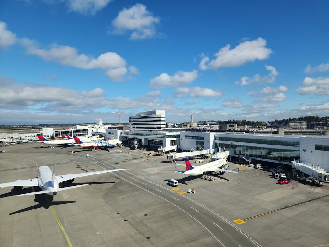 a large jetliner sitting on top of an airport tarmac — Photo by Zoshua Colah on Unsplash