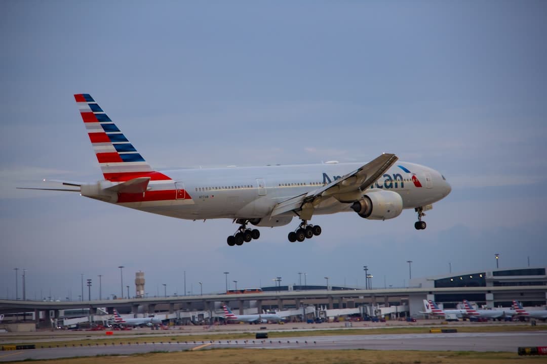 A large jetliner taking off from an airport runway — Photo by Izyan Sultanali on Unsplash