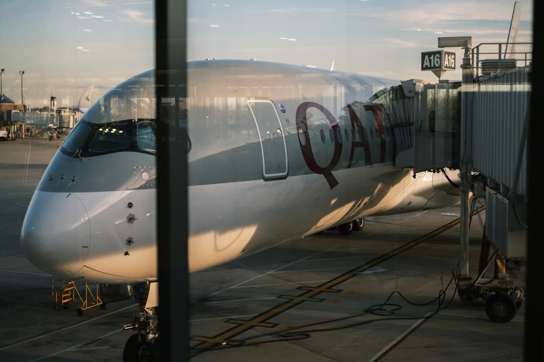 a large passenger jet sitting on top of an airport tarmac — Photo by Sean Davis on Unsplash
