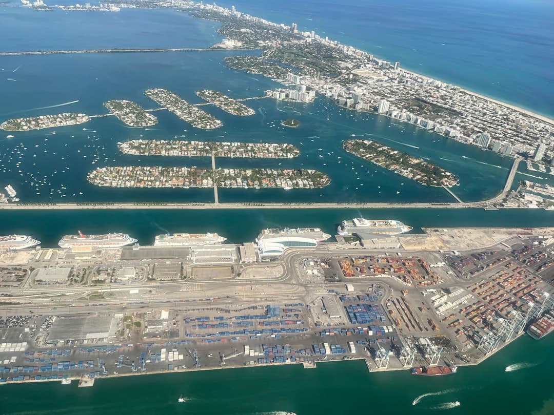 an aerial view of a city and a body of water — Photo by Fernando Jorge on Unsplash