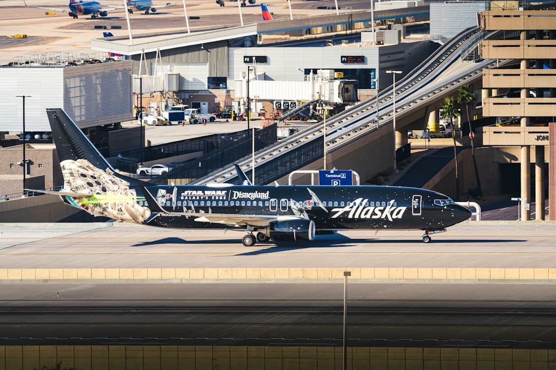 Alaska airlines plane with disney characters on tail — Photo by Hieu on Unsplash