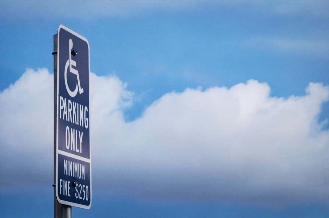 parking only signage — Photo by Clyde He on Unsplash