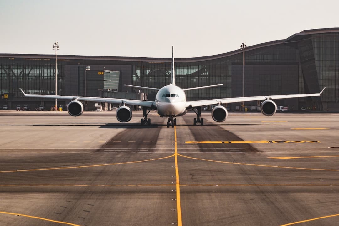 white airplane — Photo by Bao Menglong on Unsplash