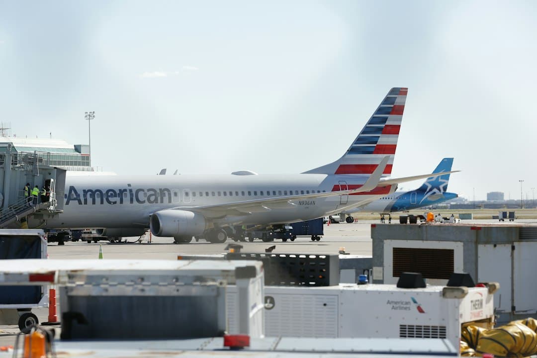 an american airlines plane is parked at an airport — Photo by Michael on Unsplash