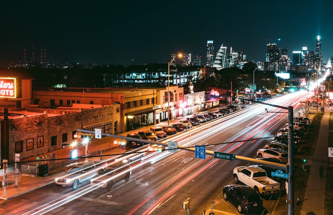 a busy city street at night with a lot of traffic — Photo by Steven Pahel on Unsplash