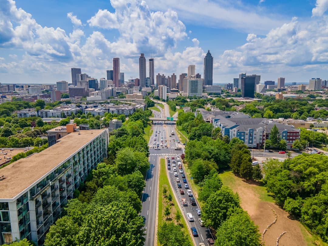 An aerial view of a city with tall buildings — Photo by Kaleb East on Unsplash