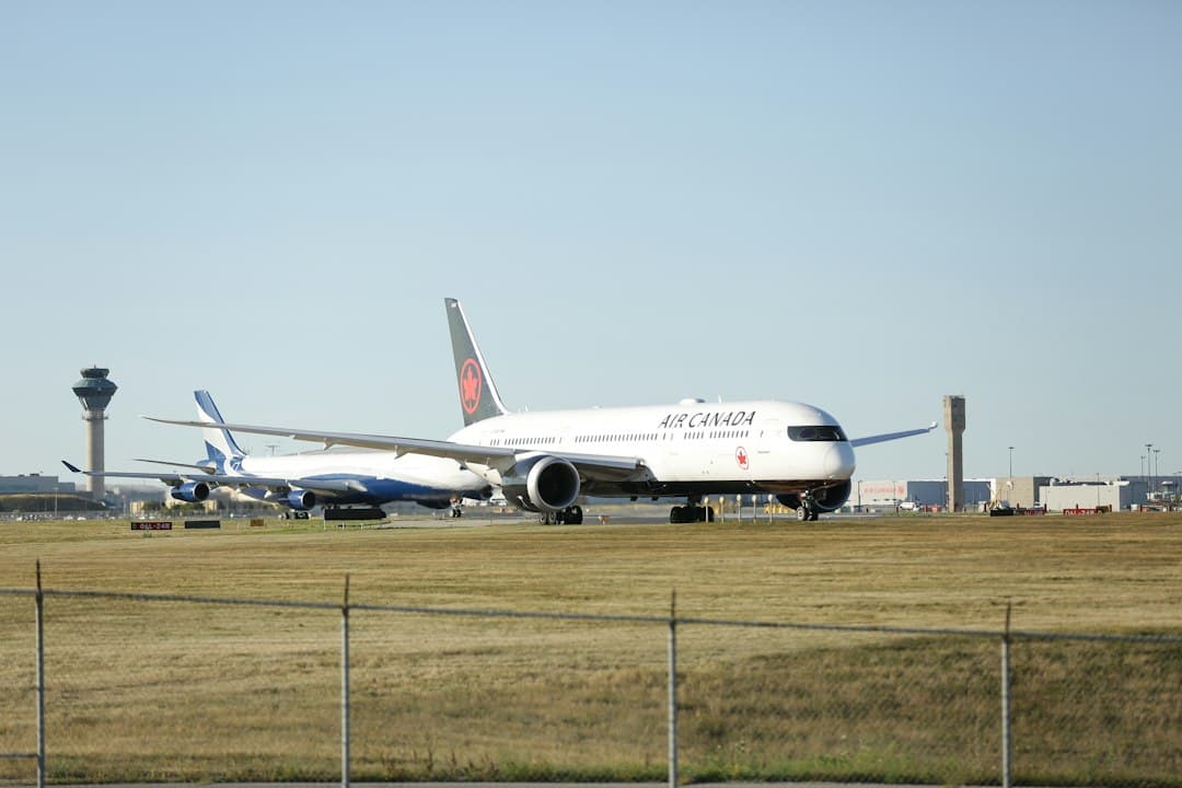a large jetliner sitting on top of an airport runway — Photo by Michael on Unsplash