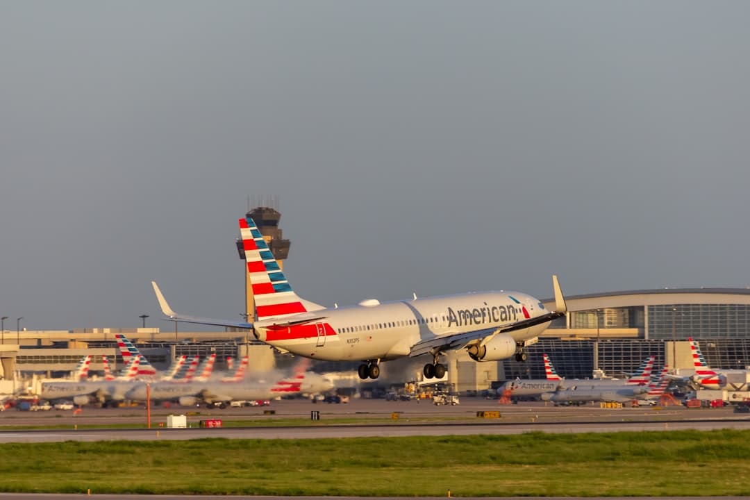 A large jetliner sitting on top of an airport tarmac — Photo by Izyan Sultanali on Unsplash