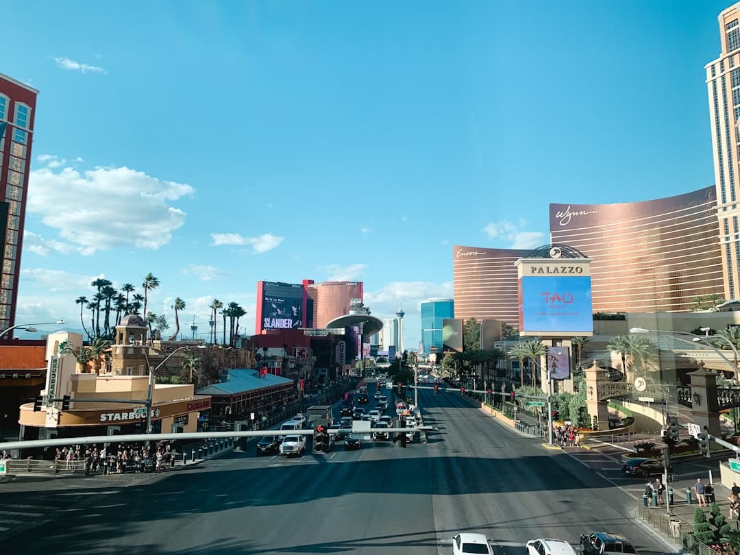 a city street filled with lots of traffic and tall buildings — Photo by Kolby Milton on Unsplash