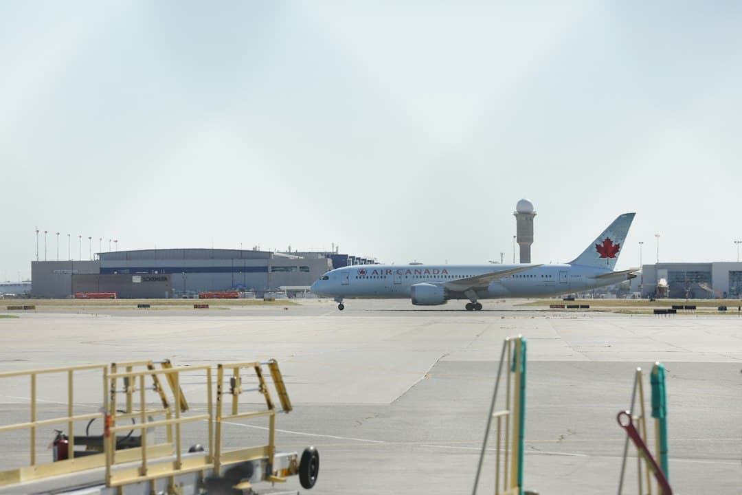 a large jetliner sitting on top of an airport tarmac — Photo by Michael on Unsplash