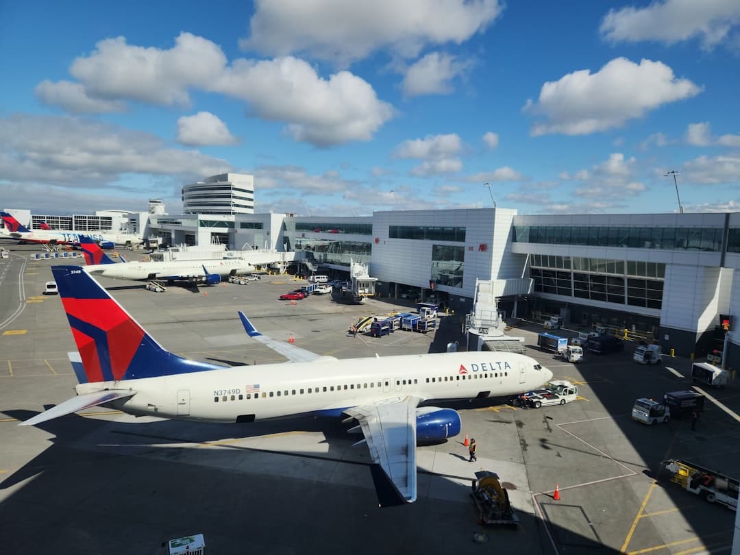 a large jetliner sitting on top of an airport tarmac — Photo by Zoshua Colah on Unsplash