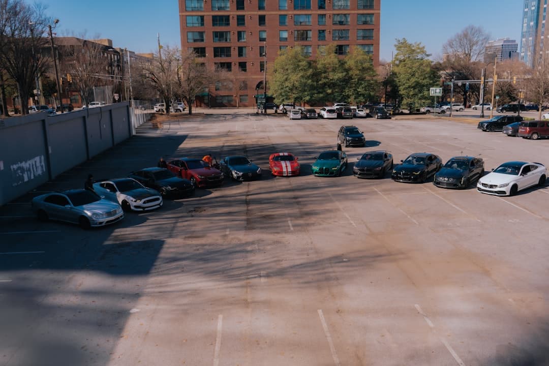 A parking lot filled with lots of parked cars — Photo by Rana Singh on Unsplash