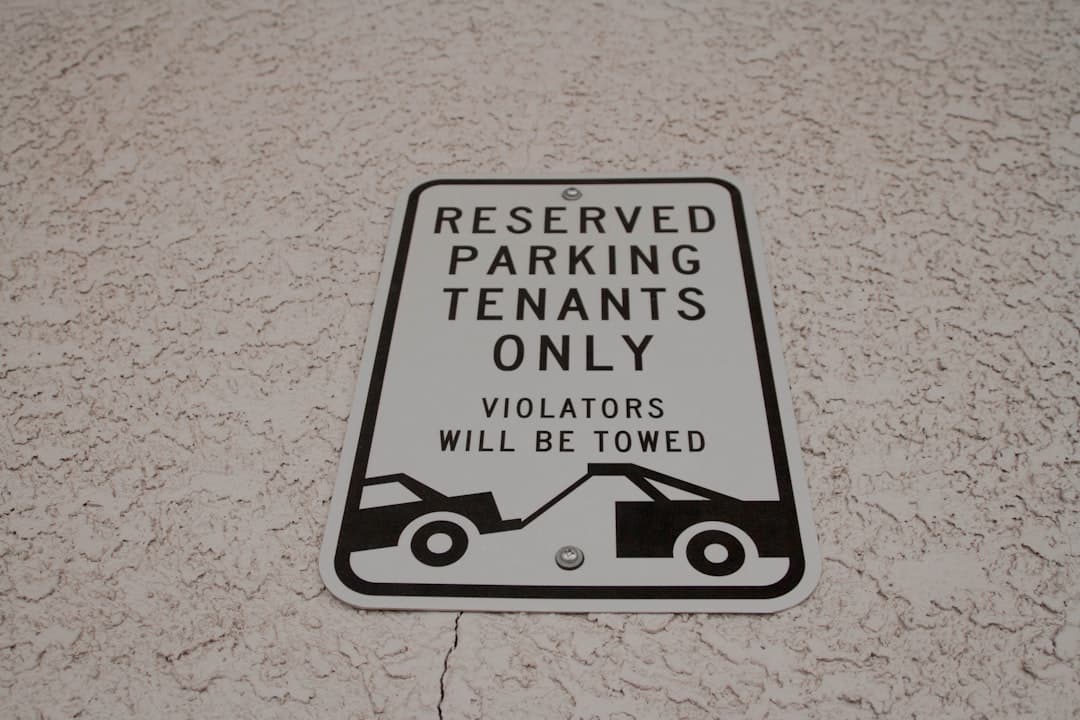 reserved parking tenants only signage — Photo by Kenny Eliason on Unsplash