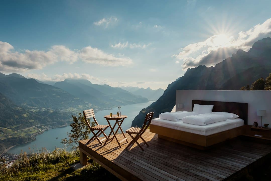 brown wooden chair on brown wooden deck — Photo by Patrick Robert Doyle on Unsplash