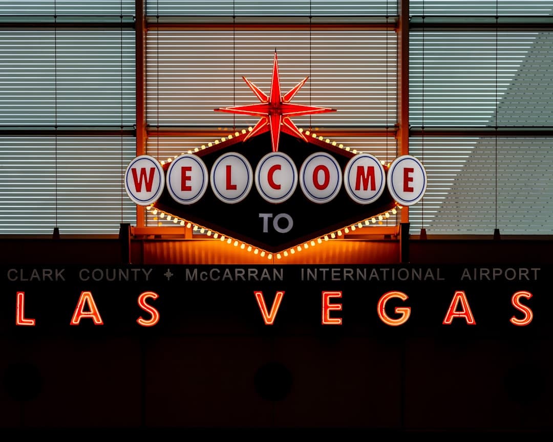 the welcome sign to las vegas is lit up — Photo by the blowup on Unsplash