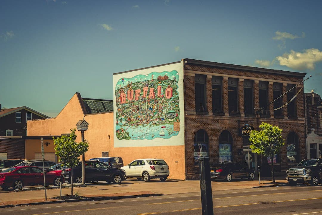 cars parked in front of building — Photo by Shamir Hunley on Unsplash