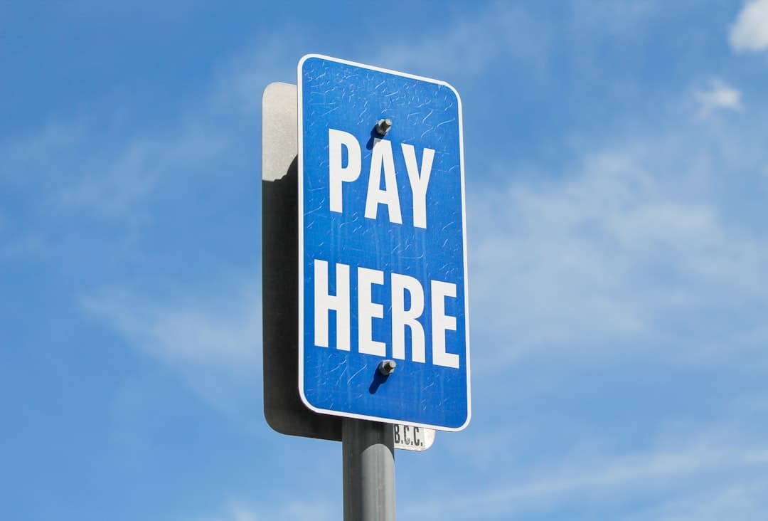 a blue sign with white text — Photo by h hc on Unsplash