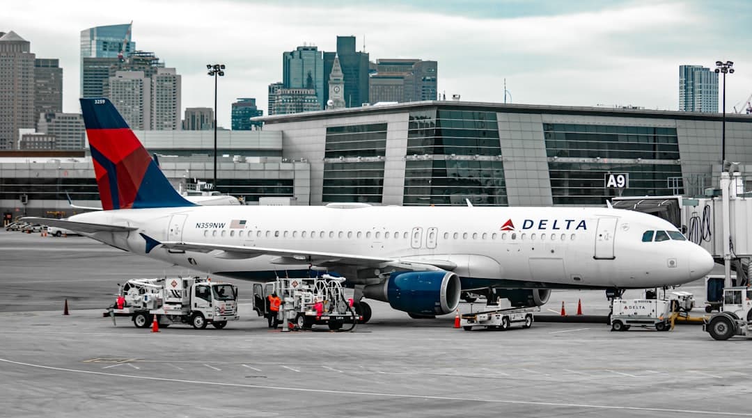 white passenger plane on airport during daytime — Photo by Isaac Struna on Unsplash